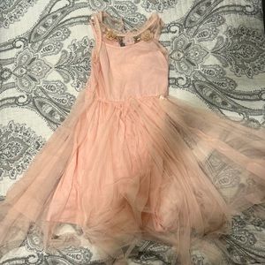 A beautiful light pink little girls dress